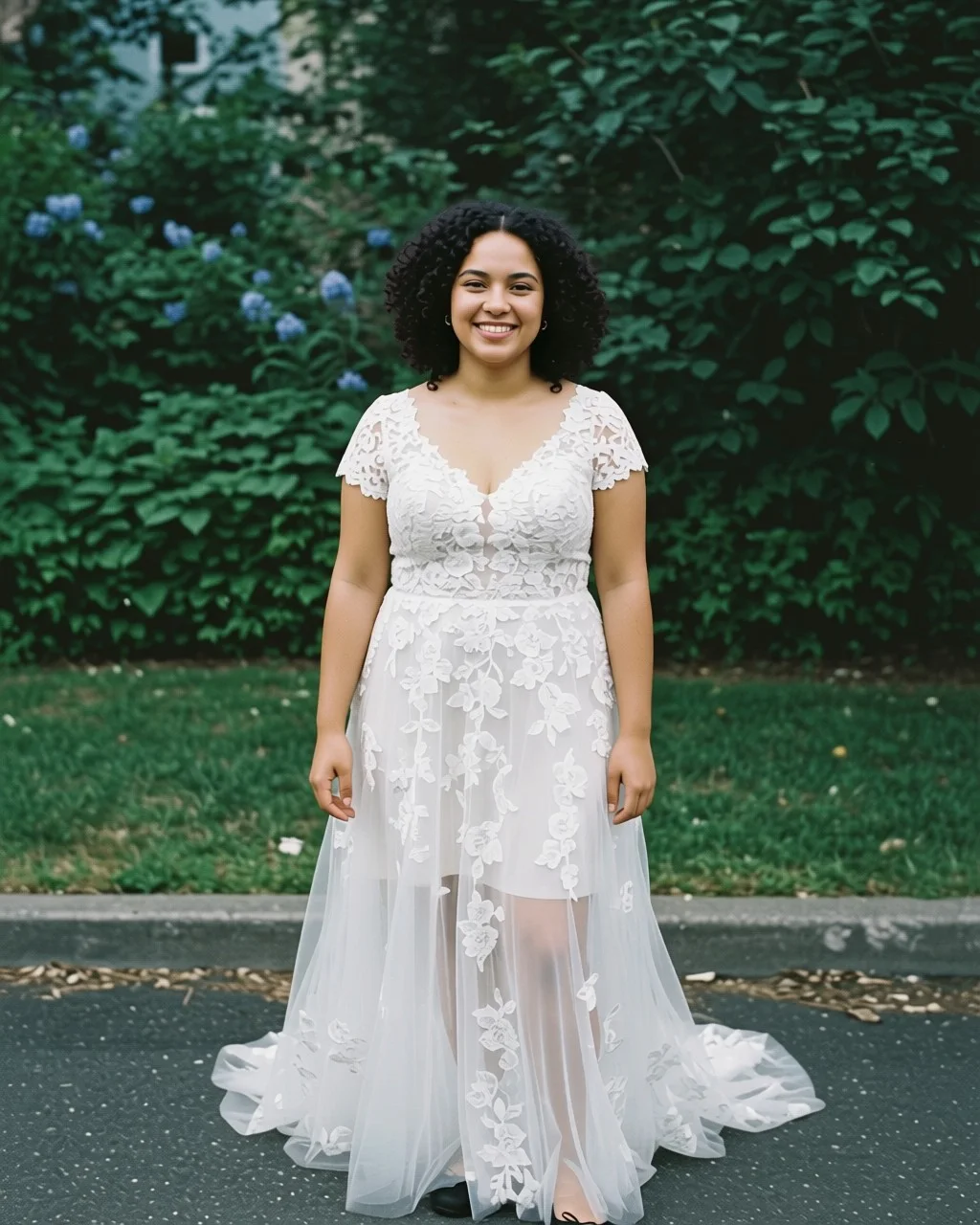 A shopper's own photograph with a lace gown rendered onto her.